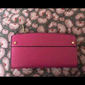 Gently used pink wallet